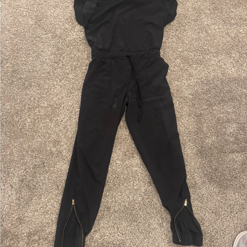 Albion Black Women's Jumpsuit with Zipper Details and flutter sleeves